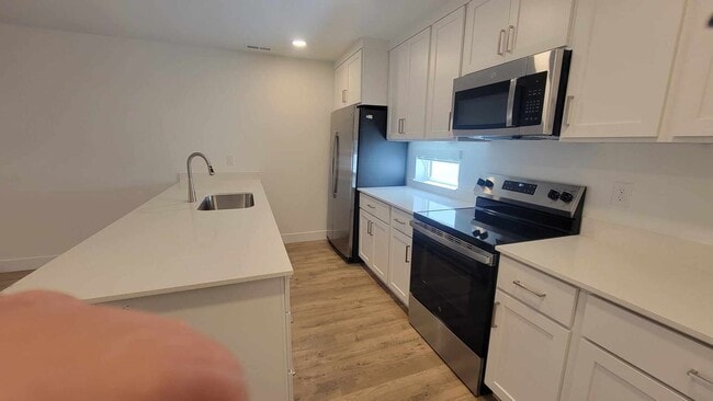 Building Photo - Brand New Regency on 9th Townhome