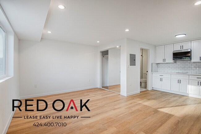 Building Photo - Bright and Cozy Studio with Mini-Split, Up...