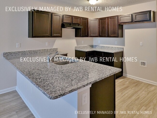 Building Photo - 8501 McGirts Village Ln