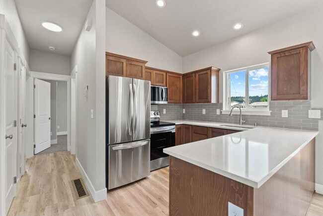 Building Photo - Newly built 4 Bedroom Duplex With Garage