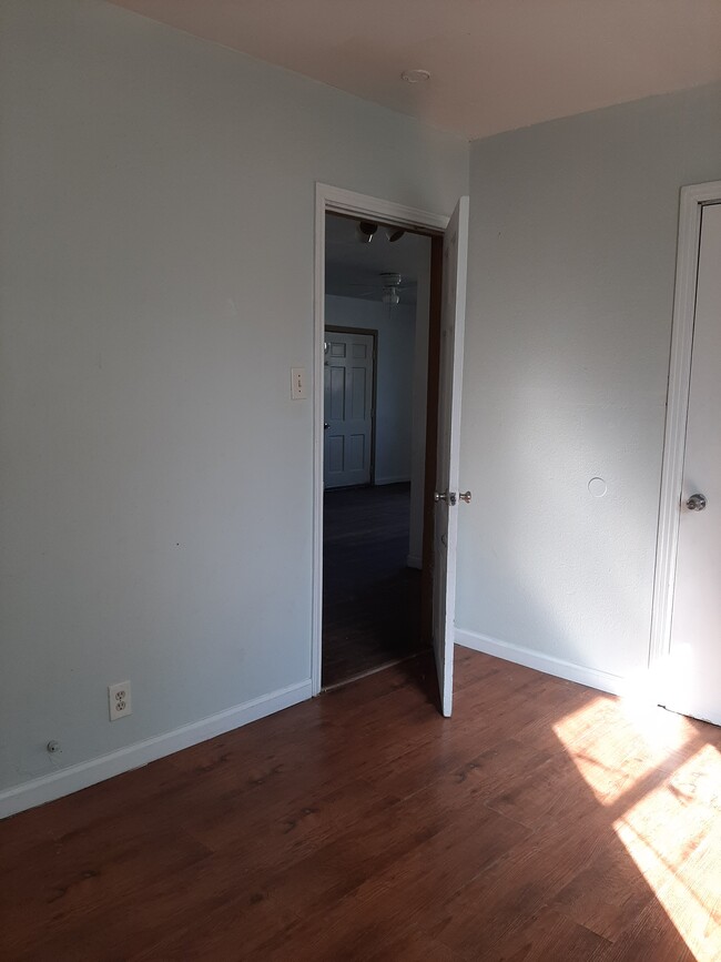 center bedroom with view to front door - 304 Kathy Dr