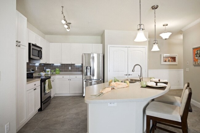 Building Photo - Tortuga Pointe by ARIUM