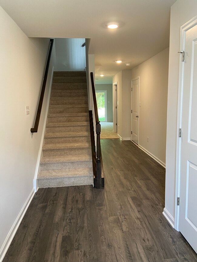1st Floor Entrance, view of walkway to Recreation Room and Stairs to 2nd floor - 403 E International Rd
