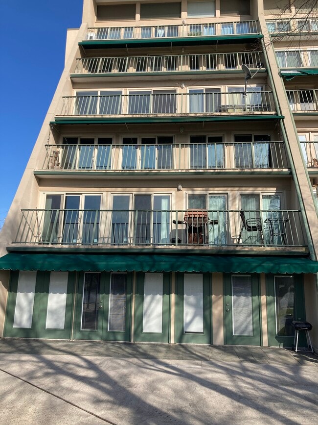 Balcony. Grills have been removed but outdoor table is yours to use - 4000 Davey St