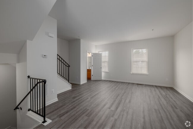 3BR, 3.5BA - 1,960SF - Living Room - The Pointe at Manorgreen Townhomes
