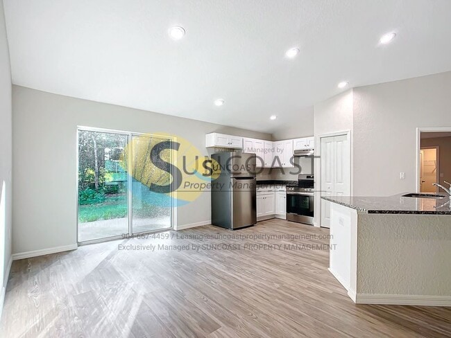 Building Photo - 9473 N Athenia Dr
