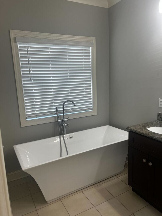 Building Photo - Welcome to your new sanctuary – a stunning...