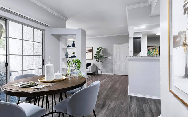 Open Floorplan with Dining Area Built in Shelves and Sliding Door to Patio - Mesa Verde