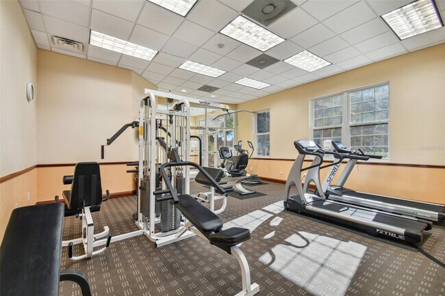 Clubhouse with gaming room, cozy lounge, and fitness center—ideal for relaxing and staying active. - 3549 Kings Rd