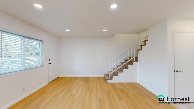 Building Photo - Spacious & Modern 3-Bedroom Condo in Prime...