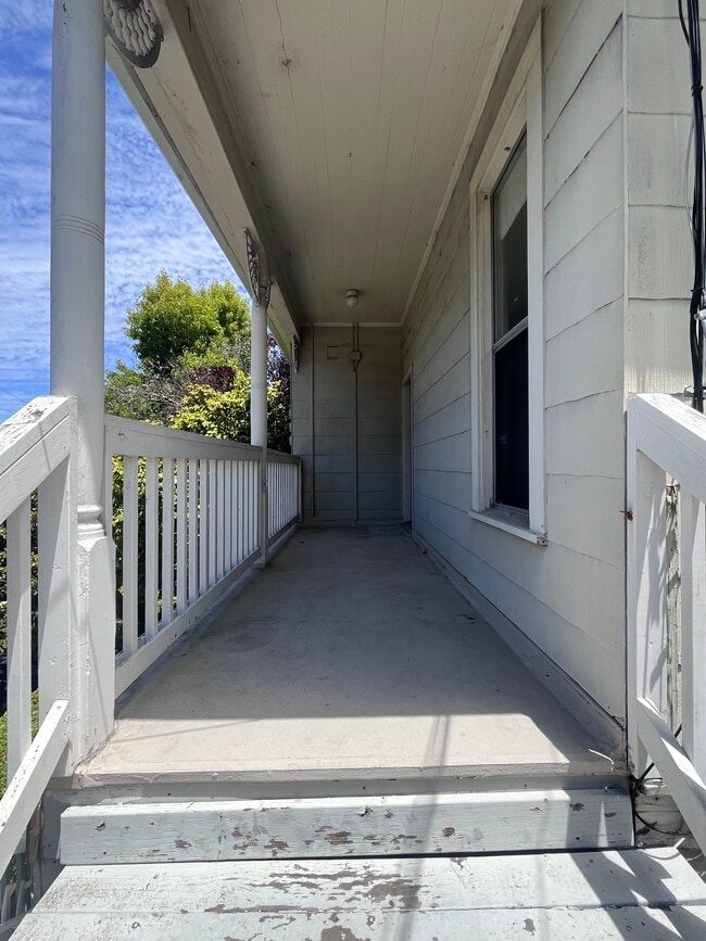 Upstairs private front entry way into top of triplex - 409 Washington Ave
