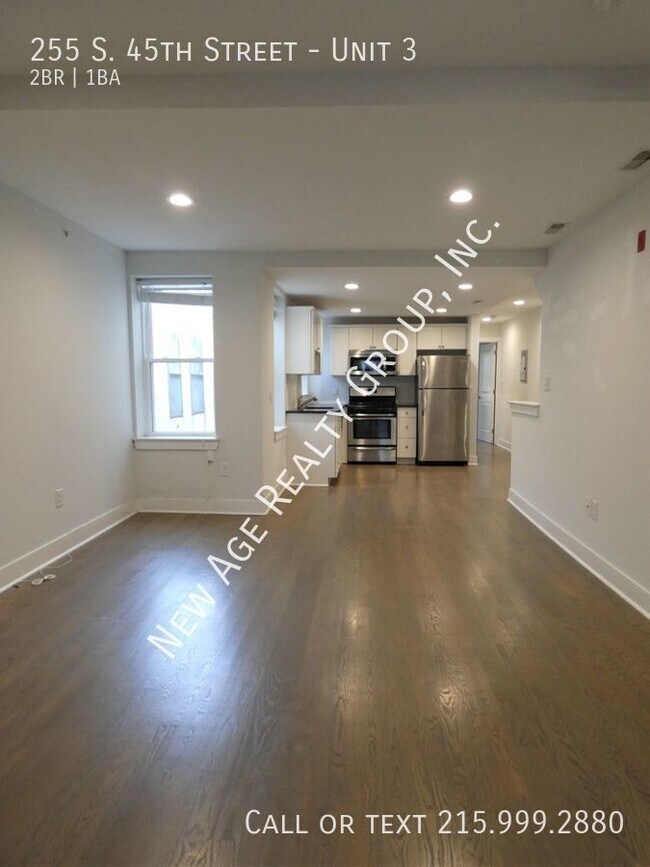 Building Photo - Bi-Level Two-bedroom Apartment With Den & ...