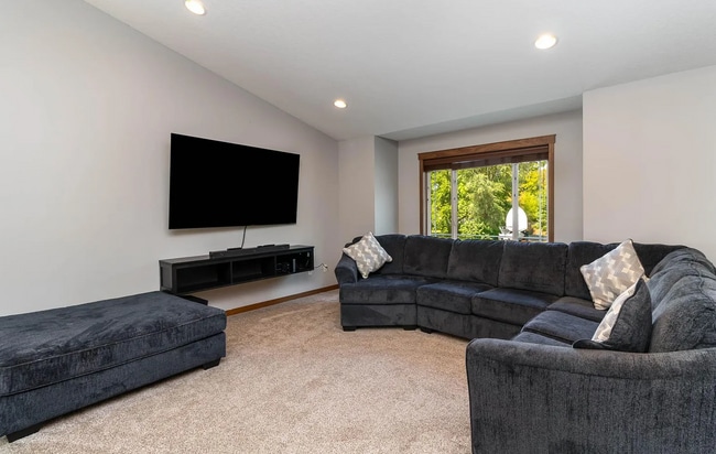 Building Photo - Modern 4BR Home with Fenced Yard + Garage ...