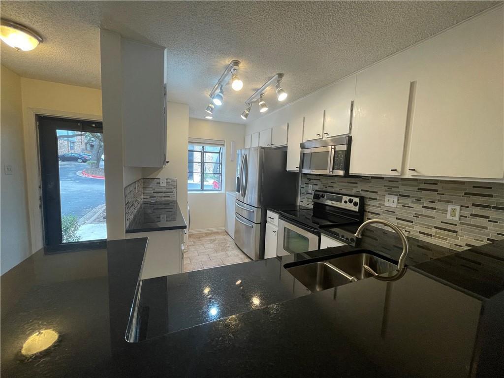 7122 Wood Hollow Dr Unit 48, Austin, TX 78731 Condo for Rent in Austin, TX