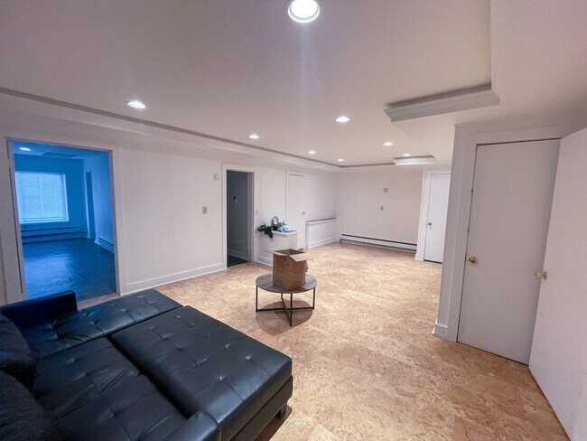 Spacious downstairs living room - 25 E Clinton St