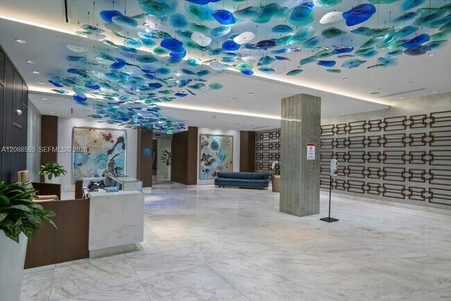 Building Photo - 10155 Collins Ave