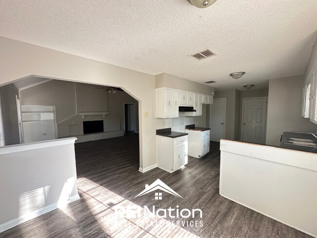 Building Photo - BARTLETT CHARMER! 3BR/2BA | Vaulted Ceilings & Brick Fireplace | 2-Car Garage!