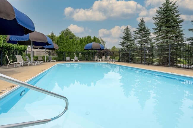 Beat the heat and take a dip in Bedford's pool. - Bedford Place Apartments