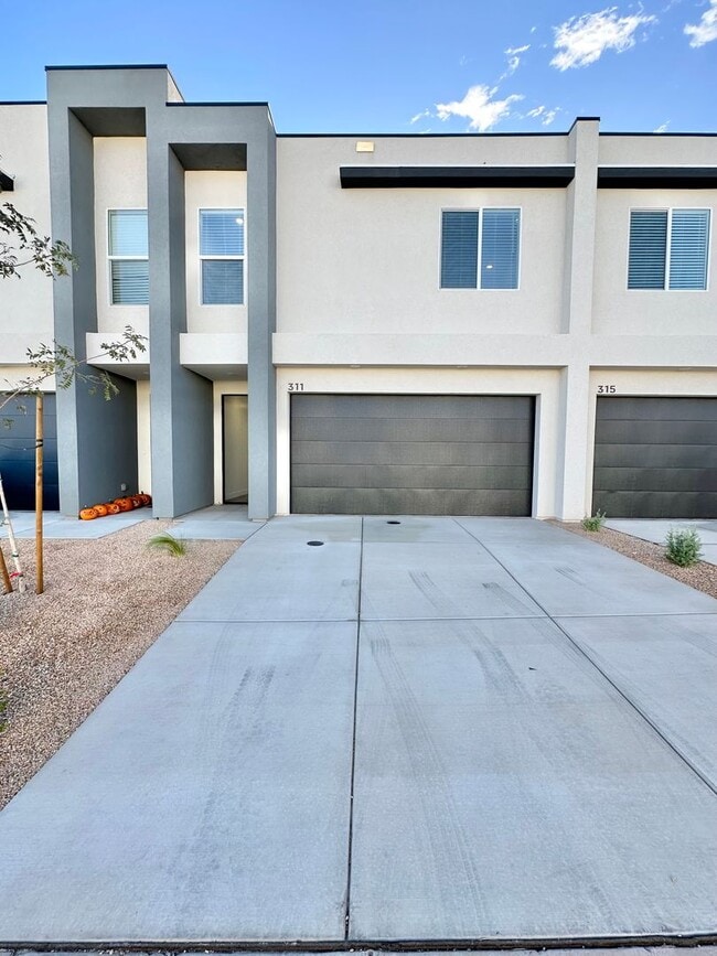 Building Photo - PET FRIENDLY!! BRAND NEW HURRICANE TOWNHOME!