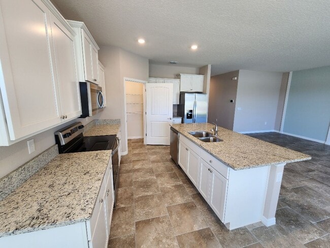 Building Photo - Lovely 4 Bedroom Home at Oak Leaf Preserve