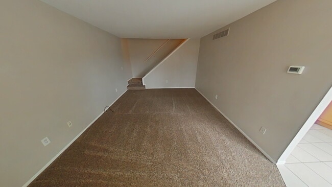 Building Photo - "2-Bed Condo Retreat in Clinton Township – Cozy Comfort Awaits!"