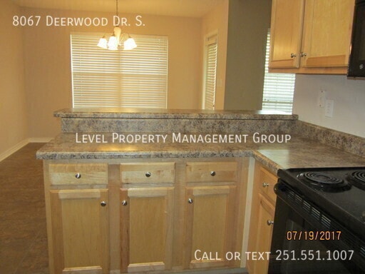 Building Photo - 8067 Deerwood Dr