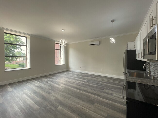 Cocina y sala de estar del apartamento - Mark Twain Building