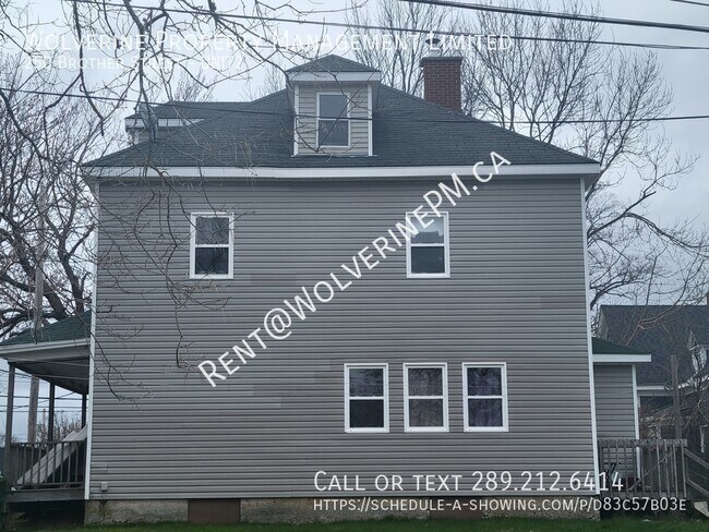 Building Photo - A Duplex on a beautifully treed lot