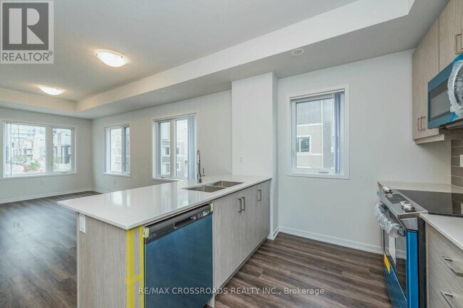 Photo du bâtiment - 140 Honeycrisp Cres