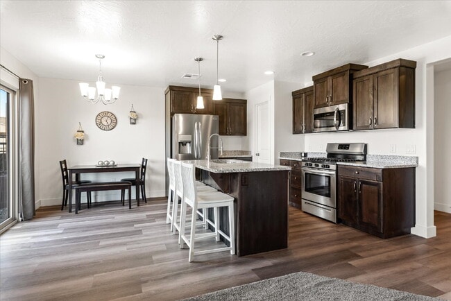 Building Photo - "Spacious 4-Bedroom Townhouse Retreat on S...