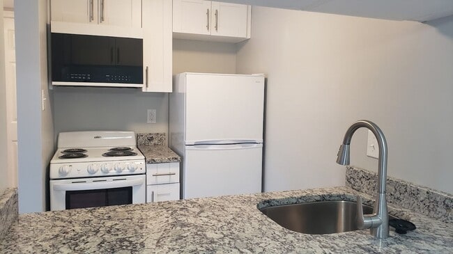 Building Photo - COMPLETELY RENOVATED