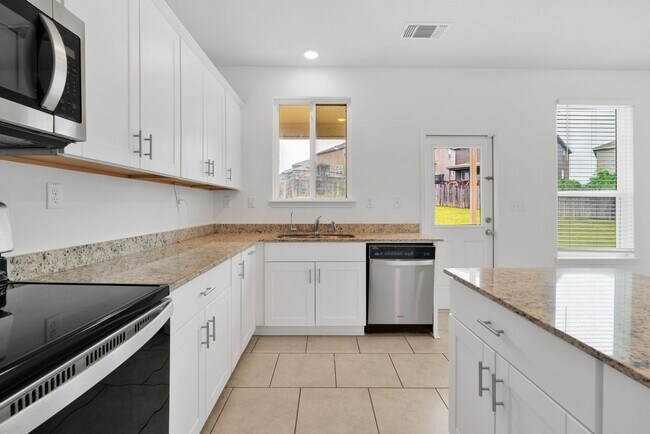 Building Photo - Charming 4-Bedroom Home in Cinco Lakes – Community Amenities & Prime Location!