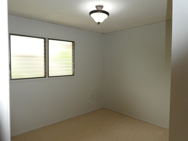 Building Photo - 98-525 Kamahao Pl