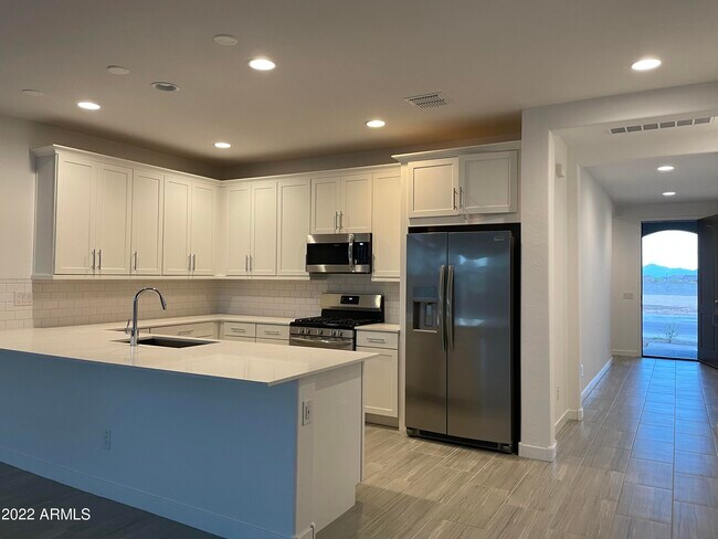 Building Photo - 12456 W Wagon Wheel Dr