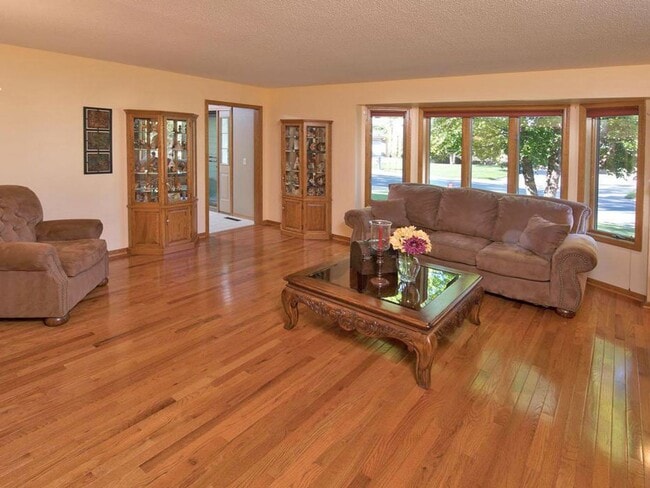 Building Photo - Elegant 2-Story has 4 BRs on Upper Level, Office, 2 Family Rooms, Fireplace & More!