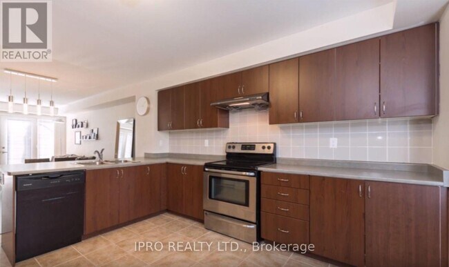 Photo du bâtiment - 3115-3115 Boxford Cres
