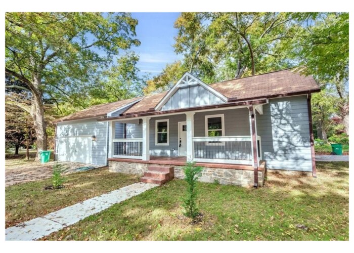 Primary Photo - Fully Renovated Ranch-Style Home with Mode...