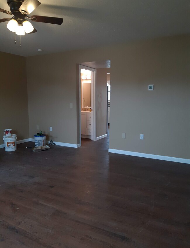 Unit A: Living Room - 306 S Keeneland Dr