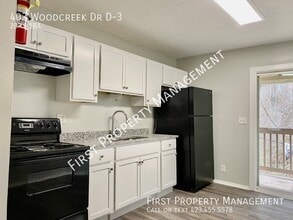 Building Photo - 403 Woodcreek Dr