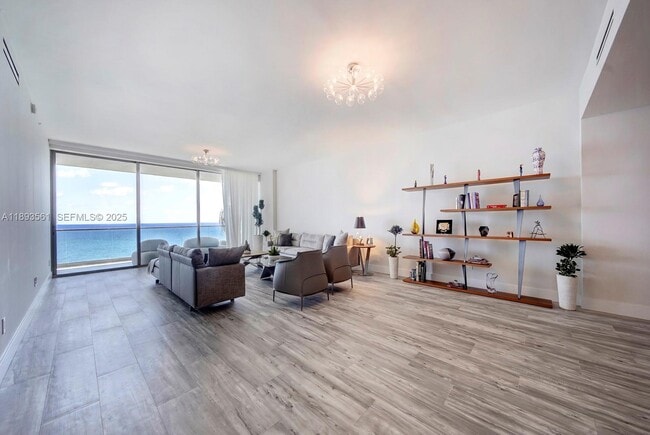 Building Photo - 10203 Collins Ave