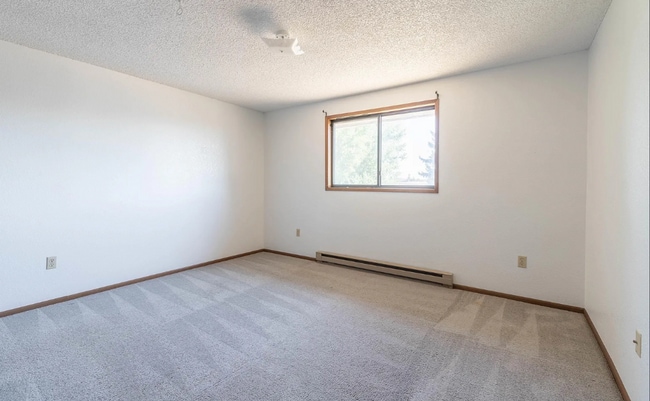 Building Photo - Three bedroom two bath home in a quiet nei...