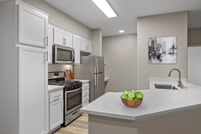 Create meals and memories in your modern kitchen. - Lasselle Place