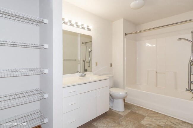 large bathrooms with lots of storage - Prairie Oaks II Senior Apartments