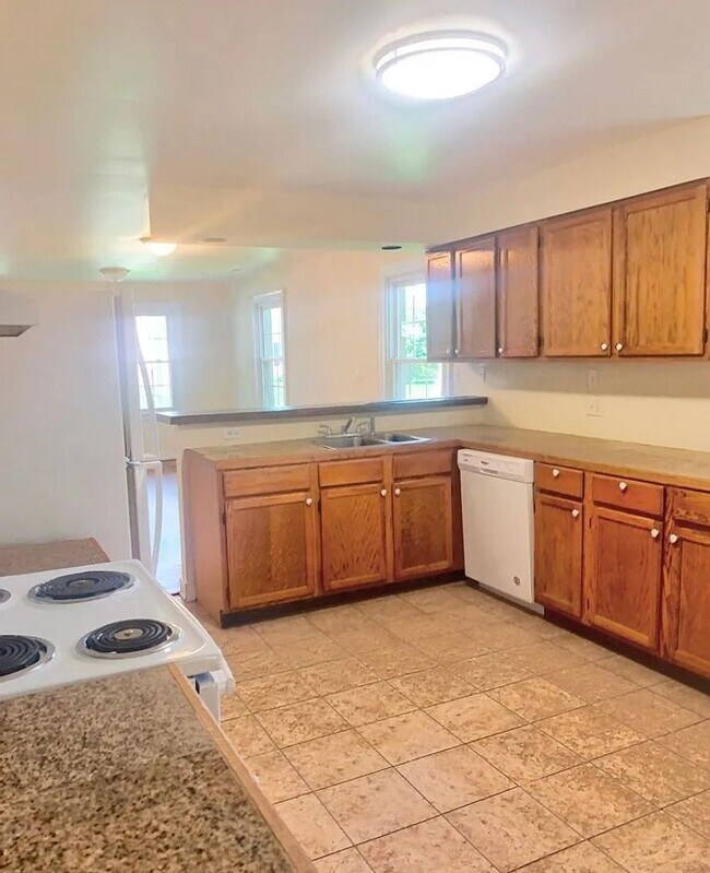 Foto del edificio - Super Cute 3 bed 2 bath Rancher with detached Garage and alley access.