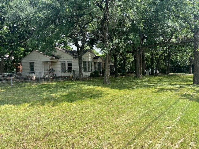 Building Photo - Denton Charmer with Big Yard, Carport & Flexible Living Space