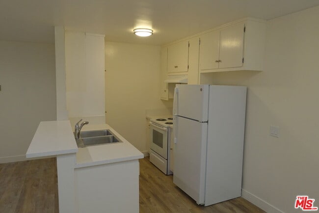 Building Photo - 1301 N Mansfield Ave