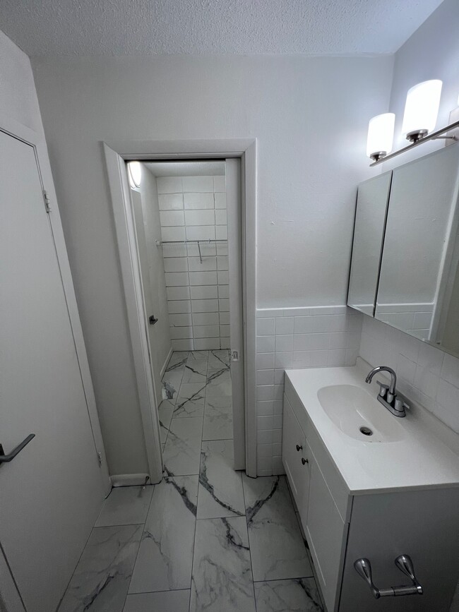 Bathroom looking into closet - 2043 Shakespeare St