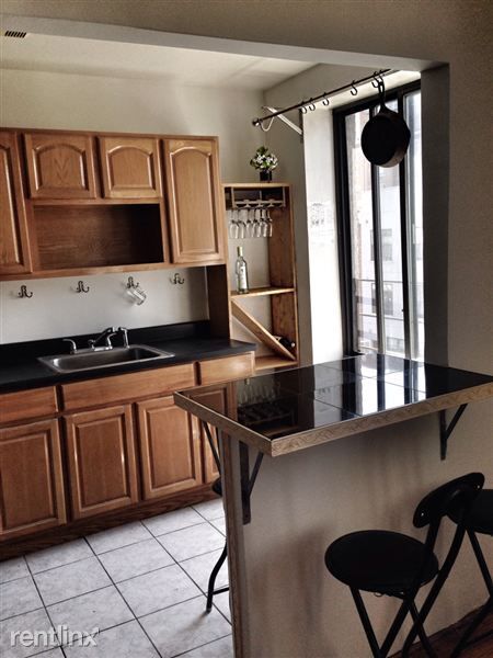 Open kitch + wine glass + wine bottle holder - 340 E 134th St