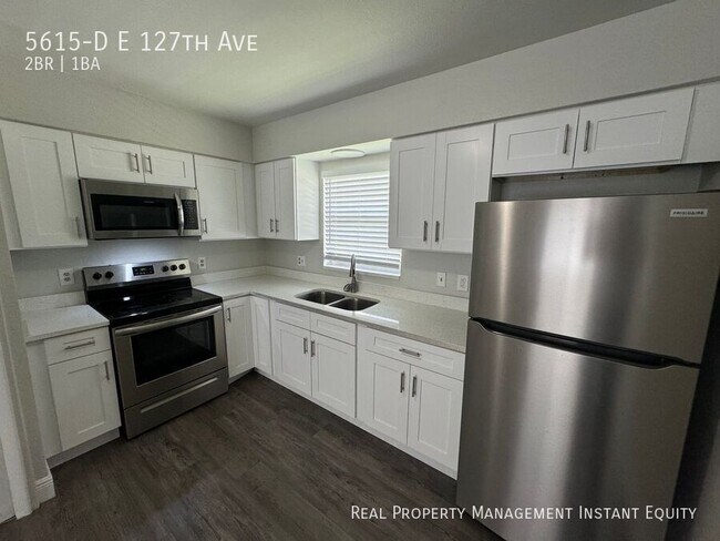 Building Photo - 5615-D E 127th Ave