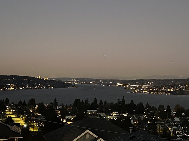 Night view is even more dramatic, city lights sparkle like jewels reflecting in the shimmering water - 8306 S 124th St